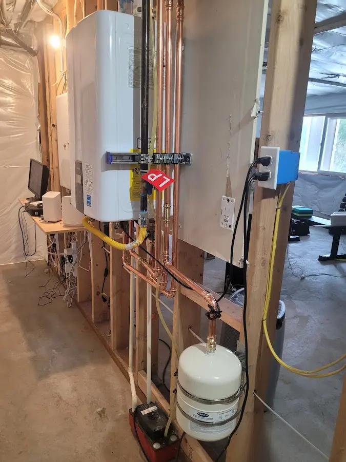Licensed plumber repairing a kitchen sink in Gardendale